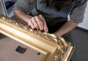 Sanding repair area of a gilt frame